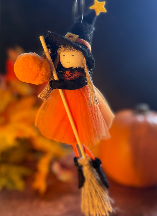 Orange Flying Witch Girl Doll With Pumpkin